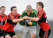 30 January 2010; Kieran Donaghy, Kerry, in action against Liam Jennings, left, and Peter Crowley, University College Cork. Munster GAA McGrath Cup Senior Football Final, Kerry v University College Cork, Austin Stack Park, Tralee, Co. Kerry. Picture credit: Brendan Moran / SPORTSFILE *** Local Caption ***