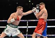 27 February 2016; Ryan Burnett, left, exchanges punches with Anthony Setteoul. Manchester Arena, Manchester, England.  Picture credit: Ramsey Cardy / SPORTSFILE