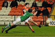 27 February 2016; Miceal McKenna, Armagh, scores a point despite the attention of Niall Cassidy, Fermanagh. Allianz Football League, Division 2, Round 3, Armagh v Fermanagh, Athletic Grounds, Armagh. Picture credit: Oliver McVeigh / SPORTSFILE