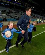 27 January 2016; Allianz mascots Mark Butler, left, and his brother Christopher, from Bayside N.S., run out with Dublin captain Stephen Cluxton at the Dublin v Monaghan game. Allianz Football League, Division 1, Round 3, Dublin v Monaghan. Croke Park, Dublin. Picture credit: Ray McManus / SPORTSFILE