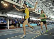 28 February 2016; Eoin Everard, Kilkenny City Harriers AC, celebrates winning the Men's 1500m event, ahead of Joe Warne, Doheny AC, Co.Cork. Eoin also won the Men's 3000m race earlier in the day. The GloHealth National Senior Indoor Championships Senior Track & Field. AIT Arena, Athlone, Co. Westmeath. Picture credit: Tomas Greally / SPORTSFILE