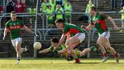 28 February 2016; Eoin McHugh, Donegal, in action against Diarmuid O'Connor, Mayo. Allianz Football League, Division 1, Round 3, Donegal v Mayo, MacCumhaill Park, Ballybofey, Co. Donegal. Picture credit: Oliver McVeigh / SPORTSFILE