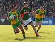 28 February 2016; Frank McGlynn, Donegal, in action against Kevin McLoughlin, Mayo. Allianz Football League, Division 1, Round 3, Donegal v Mayo, MacCumhaill Park, Ballybofey, Co. Donegal. Picture credit: Oliver McVeigh / SPORTSFILE