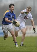 28 February 2016; Mark Hughes, Longford, in action against Peter Kelly, Kildare. Allianz Football League, Division 3, Round 3, Longford v Kildare. Glennon Brothers Pearse Park, Longford. Picture credit: Piaras Ó Mídheach / SPORTSFILE
