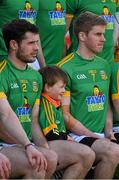 28 February 2016; Five year old Meath mascot, Patrick Gaughran, from Robinstown, takes his place between Donal Keoghan and Darragh Smyth in the front row as the team photograph is taken. Allianz Football League, Division 2, Round 3, Meath v Cavan, Páirc Táilteann, Navan, Co. Meath. Picture credit: Ray McManus / SPORTSFILE