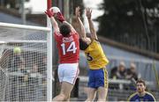 28 February 2016; Peter Kelleher, Cork, scores his side's first goal despite the efforts of Neil Collins, and Roscommon goalkeeper Geoffrey Claffey. Allianz Football League, Division 1, Round 3, Cork v Roscommon. Páirc Uí Rinn, Cork. Picture credit: Diarmuid Greene / SPORTSFILE