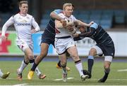 28 February 2016; Stuart Olding, Ulster, is tackled by Aled Summerhill and Rey Lee-lol, Cardiff Blues. Guinness PRO12 Round 16, Cardiff Blues v Ulster, BT Sport Cardiff Arms Park, Cardiff, Wales. Picture credit: Chris Fairweather / SPORTSFILE