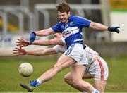 28 February 2016; Ruairi O'Conor, Laois, has his last minute shot on goal blocked by Padraig McNulty, Tyrone. Allianz Football League, Division 2, Round 3, Laois v Tyrone, O'Moore Park, Portlaoise, Co. Laois. Picture credit: David Maher / SPORTSFILE