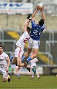 28 February 2016; Brendan Begley, Laois, in action against Padraig McNulty, Tyrone. Allianz Football League, Division 2, Round 3, Laois v Tyrone, O'Moore Park, Portlaoise, Co. Laois. Picture credit: David Maher / SPORTSFILE