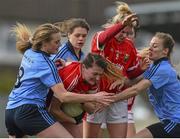 28 February 2016; Annie Walsh, Cork, is tackled by Amy Connolly, Dublin, left, and Nicole Owens, Dublin. Lidl Ladies Football National League, Division 1, Dublin v Cork, Parnell Park, Dublin. Picture credit: Ramsey Cardy / SPORTSFILE