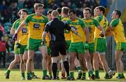 28 February 2016;  Donegal players surround referee Barry Cassidy after he awarded a penalty to Mayo. Allianz Football League, Division 1, Round 3, Donegal v Mayo, MacCumhaill Park, Ballybofey, Co. Donegal. Picture credit: Oliver McVeigh / SPORTSFILE