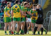 28 February 2016; Eamonn McGee and other Donegal players surround referee Barry Cassidy after he awarded a penalty to Mayo. Allianz Football League, Division 1, Round 3, Donegal v Mayo, MacCumhaill Park, Ballybofey, Co. Donegal. Picture credit: Oliver McVeigh / SPORTSFILE
