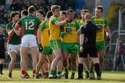 28 February 2016; Donegal players surround referee Barry Cassidy after he awarded a penalty to Mayo. Allianz Football League, Division 1, Round 3, Donegal v Mayo, MacCumhaill Park, Ballybofey, Co. Donegal. Picture credit: Oliver McVeigh / SPORTSFILE