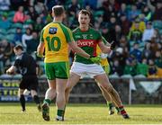 28 February 2016; Diarmuid O'Connor, Mayo, celebrates in front of Anthony Thompson, Donegal, after scoring a goal from a penalty. Allianz Football League, Division 1, Round 3, Donegal v Mayo, MacCumhaill Park, Ballybofey, Co. Donegal. Picture credit: Oliver McVeigh / SPORTSFILE