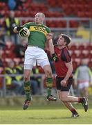 28 February 2016; Kieran Donaghy, Kerry, catches a kick out with one hand while holding off the challenge of Peter Turley, Down. Allianz Football League, Division 1, Round 3, Down v Kerry, Páirc Esler, Newry, Co. Down. Picture credit: Brendan Moran / SPORTSFILE