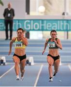 28 February 2016; Joan Healy, Bandon A.C. and Niamh Whelan, Ferrybank A.C., competing in the Women's 60m Semi Final at the GloHealth National Senior Indoor Championships Senior Track & Field. AIT Arena, Athlone, Co. Westmeath. Picture credit: Sam Barnes / SPORTSFILE