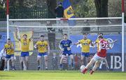 28 February 2016; Roscommon players, from left to right, Sean McDermott, Niall McInerney, Conor Daly, goalkeeper Geoffrey Claffey, Ian Kilbride, and Neil Collins, face a second-half free from Cork's Colm O'Neill. Allianz Football League, Division 1, Round 3, Cork v Roscommon. Páirc Uí Rinn, Cork. Picture credit: Diarmuid Greene / SPORTSFILE