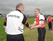 21 June 2009; Tyrone manager Mickey Harte shakes hands with Derry manager Damien Cassidy at the end of the game. GAA Football Ulster Senior Championship Semi-Final, Tyrone v Derry, Casement Park, Belfast, Co. Antrim. Photo by Sportsfile