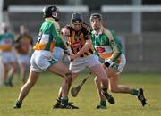 31 January 2010; Lester Ryan, Kilkenny, in action against James Keane, left, and Rory Hanniffy, Offaly. Walsh Cup Quarter-Final, Offaly v Kilkenny, O'Connor Park, Tullamore, Co. Offaly. Picture credit: Brian Lawless / SPORTSFILE *** Local Caption ***