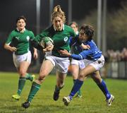 5 February 2010; Alison Miller, Ireland, on her way to scoring a try despite the efforts of Furlan Manuela, Italy. Women's Six Nations Rugby Championship, Ireland v Italy, Ashbourne RFC, Ashbourne, Co. Meath. Picture credit: Barry Cregg / SPORTSFILE