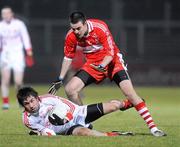 6 February 2010; Joe McMahon, Tyrone, in action against Caolan O'Boyle, Derry. Allianz GAA Football National League, Division 1, Round 1, Derry v Tyrone, Celtic Park, Derry. Picture credit: Oliver McVeigh / SPORTSFILE