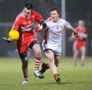 6 February 2010; Caolan O'Boyle, Derry, in action against Enda McGinley, Tyrone. Allianz GAA Football National League, Division 1, Round 1, Derry v Tyrone, Celtic Park, Derry. Picture credit: Oliver McVeigh / SPORTSFILE