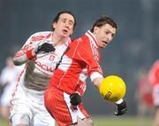 6 February 2010; Gerard O'Kane, Derry, in action against Colm Cavanagh, Tyrone. Allianz GAA Football National League, Division 1, Round 1, Derry v Tyrone, Celtic Park, Derry. Picture credit: Oliver McVeigh / SPORTSFILE