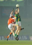 6 February 2010; Nigel Crawford, Meath, in action against James Lavery, back, and Charlie Vernon, Armagh. Allianz GAA Football National League, Division 2, Round 1, Meath v Armagh, Pairc Tailteann, Navan, Co. Meath. Picture credit: Pat Murphy / SPORTSFILE