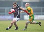 7 February 2010; Gavin Hoey, Westmeath, in action against James Keeney, Donegal. Allianz GAA Football National League, Division 2, Round 1, Westmeath v Donegal. Cusack Park, Mullingar, Co. Westmeath. Photo by Sportsfile
