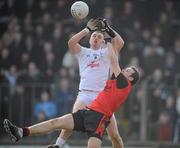 7 February 2010; Daryl Flynn, Kildare, in action against Ambrose Rodgers, Down. Allianz GAA Football National League, Division 2, Round 1, Kildare v Down. St Conleth's Park, Newbridge, Co. Kildare. Picture credit: Brian Lawless / SPORTSFILE
