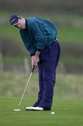 14 April 2001; Mark Murphy of Waterville GC watches his putt on the 7th green during the West of Ireland Open Golf Championship at Sligo Golf Club in Rosses Point in Sligo. Photo by Brendan Moran/Sportsfile