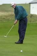 14 April 2001; Philip McLaughlin of Ballyliffin GC watches his putt on the 18th green during the West of Ireland Open Golf Championship at Sligo Golf Club in Rosses Point in Sligo. Photo by Brendan Moran/Sportsfile