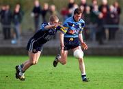 11 April 2001; Ciarán McManus of UCD in action against Kevin Hughes of UUJ during the Sigerson Cup Final match between UCD and UUJ at Scotstown GAA in Monaghan. Photo by Damien Eagers/Sportsfile