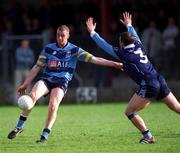 11 April 2001; Nigel Crawford of UCD in action against Enda McNulty of UUJ during the Sigerson Cup Final match between UCD and UUJ at Scotstown GAA in Monaghan. Photo by Damien Eagers/Sportsfile
