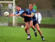 11 April 2001; Raymond Johnston of UUJ in action against Nigel Crawford of UCD during the Sigerson Cup Final match between UCD and UUJ at Scotstown GAA in Monaghan. Photo by Damien Eagers/Sportsfile
