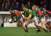 8 April 2001; Fergal Costello of Mayo in action against Richie Kealy of Meath during the Allianz GAA National Football League Division 1B match between Mayo and Meath at James Stephen's Park in Ballina, Mayo. Photo by Brendan Moran/Sportsfile