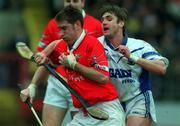 8 April 2001; Mark Landers, Cork in action against Tony Browne, Waterford. Cork v Waterford, National Hurling League, Pairc Ui Chaoimh, Cork. Picture credit; David Maher / SPORTSFILE