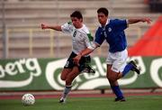 23 March 2001; Michael Reddy of Republic of Ireland in action against Georgios Kkaras of Cyprus during the UEFA European U21 Championship Qualification Group 2 game between Cyprus and Republic of Ireland at the GSZ Stadium in Larnaca, Cyprus. Photo by Damien Eagers/Sportsfile