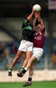 16 April 2001; Liam O'Sullivan of Nemo Rangers in action against Peadar Gardiner of Crossmolina during the AIB All-Ireland Senior Club Football Championship Final match between Crossmolina and Nemo Rangers at Croke Park in Dublin. Photo by Damien Eagers/Sportsfile