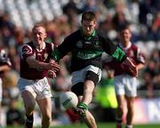 16 April 2001; Derek Kavanagh of Nemo Rangers in action against Patrick McAndrew of Crossmolina during the AIB All-Ireland Senior Club Football Championship Final match between Crossmolina and Nemo Rangers at Croke Park in Dublin. Photo by Ray Lohan/Sportsfile