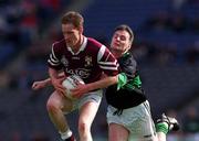 16 April 2001; James Nallen of Crossmolina in action against Kevin Cahill of Nemo Rangers during the AIB All-Ireland Senior Club Football Championship Final match between Crossmolina and Nemo Rangers at Croke Park in Dublin. Photo by Ray McManus/Sportsfile