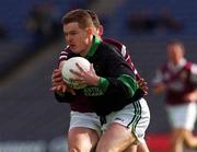 16 April 2001; Paul Brophy of Nemo Rangers in action against Enda Lavelle of Crossmolina during the AIB All-Ireland Senior Club Football Championship Final match between Crossmolina and Nemo Rangers at Croke Park in Dublin. Photo by Ray McManus/Sportsfile