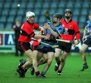 6 April 2001; Brendan Murphy of UCD in action against Alan Kirwan of UCC during the Fitzgibbon Cup Final match between UCD and UCC at Parnell Park in Dublin. Photo by Damien Eagers/Sportsfile