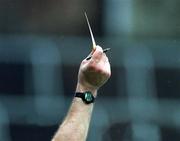 8 April 2001; Referee Séamus Roche issues a yellow card during the Allianz GAA National Hurling League Division 1B Round 4 match between Cork and Waterford at Páirc Uí Chaoimh in Cork. Photo by David Maher/Sportsfile
