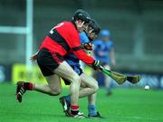 6 April 2001; John Browne of UCC is tackled by Brendan Murphy of UCD during the Fitzgibbon Cup Final match between UCD and UCC at Parnell Park in Dublin. Photo by Damien Eagers/Sportsfile
