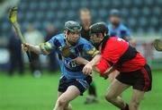 6 April 2001; Paul Doheny of UCD in action against Rory O'Doherty of UCC during the Fitzgibbon Cup Final match between UCD and UCC at Parnell Park in Dublin. Photo by Damien Eagers/Sportsfile