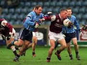 8 April 2001; Seán Óg De Paor of Galway is tackled by Vinnie Murphy of Dublin during the Allianz GAA National Football League Division 1A match between Dublin and Galway at Parnell Park in Dublin. Photo by Aoife Rice/Sportsfile