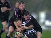 17 April 2001; Brian O'Driscoll of Blackrock College is tackled by Mark O'Kelly and Michael Smyth of Terenure College during the AIB All-Ireland League Division 1 match between Blackrock College and Terenure College at Blackrock College RFC at Stradbrook Road in Dublin. Photo by Brendan Moran/Sportsfile