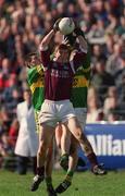 15 April 2001; Kieran Fitzgerald of Galway fields a ball ahead of Aodán Mac Gearailt, left, and Dara Ó Cinnéide of Kerry during the Allianz GAA National Football League Division 1A match between Galway and Kerry at Tuam Stadium in Tuam, Galway. Photo by Brendan Moran/Sportsfile