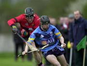 18 April 2001; Brendan Murphy of UCD in action against John Browne of UCC the Fitzgibbon Cup Final Replay match between UCD and UCC at McDonagh Park in Nenagh, Tipperary. Photo by Ray McManus/Sportsfile